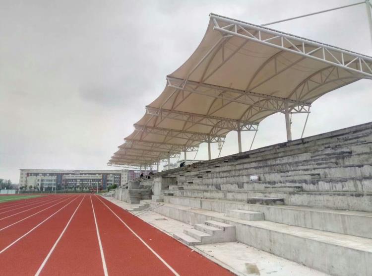 河南学校体育场看台张拉膜结构雨棚厂家